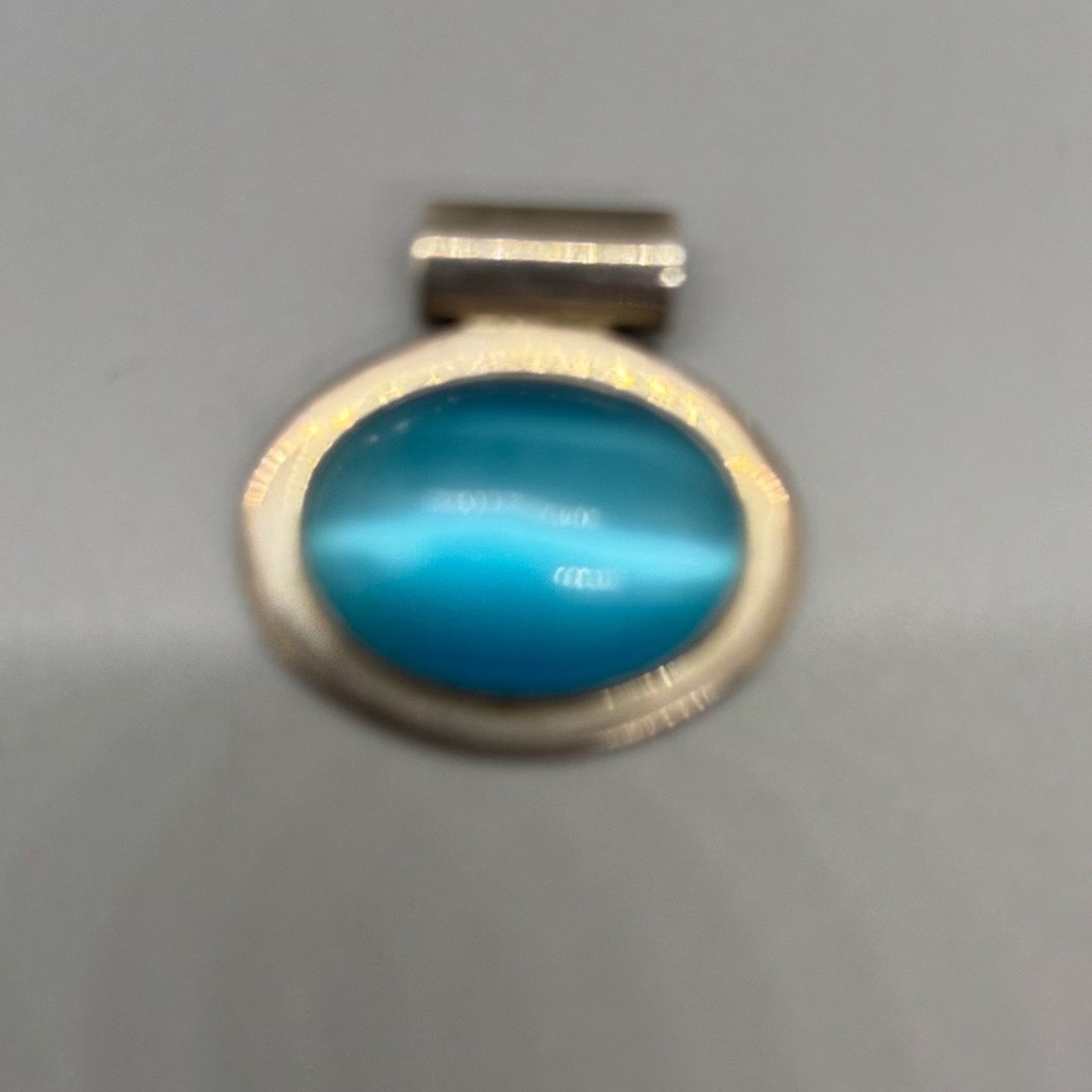 Elegant Silver and Blue Pendant